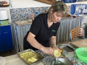 Moulding rice for arancini, Sicily cooking class